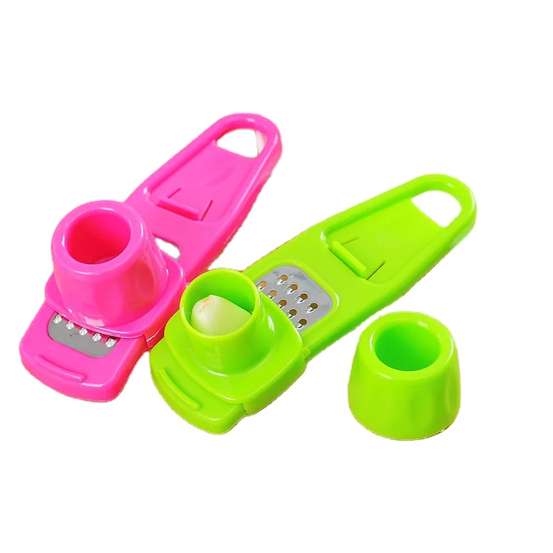 Explosive hot selling kitchen household garlic grinder creative multifunctional ginger grinder and garlic cutter wholesale