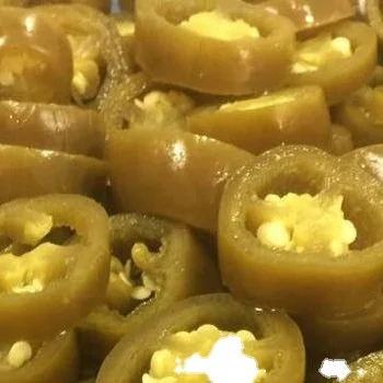 Sliced Green Jalapeno pepper preserved in brine ready for eat as appetizer  made in Egypt all packages you need
