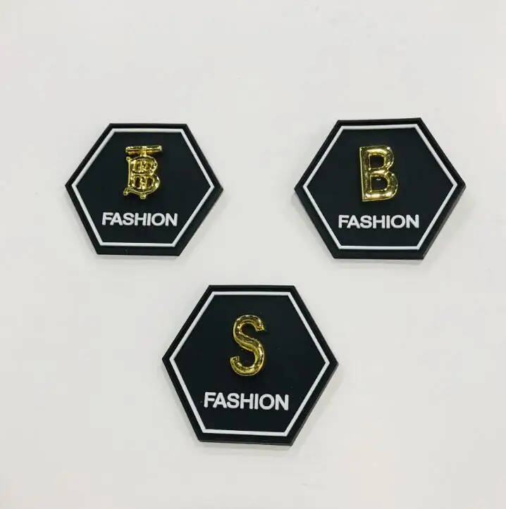 customized brand name labels Rubber badge embossed rubber heat transfer 3d bag labels heat seal labels