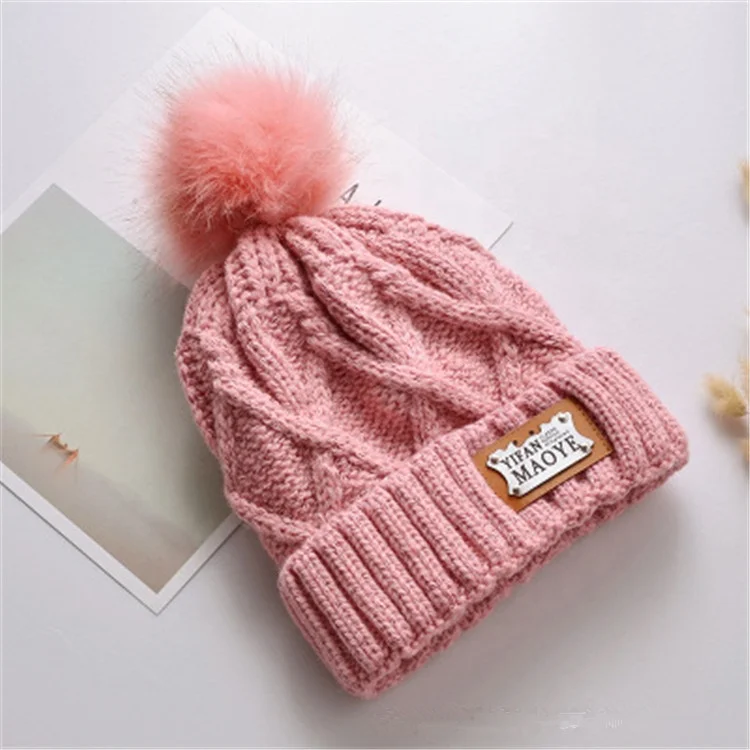 
Wholesale Winter Unisex Winter Blank Knitted Leather Label High Quality Pom Pom Beanie Hat 