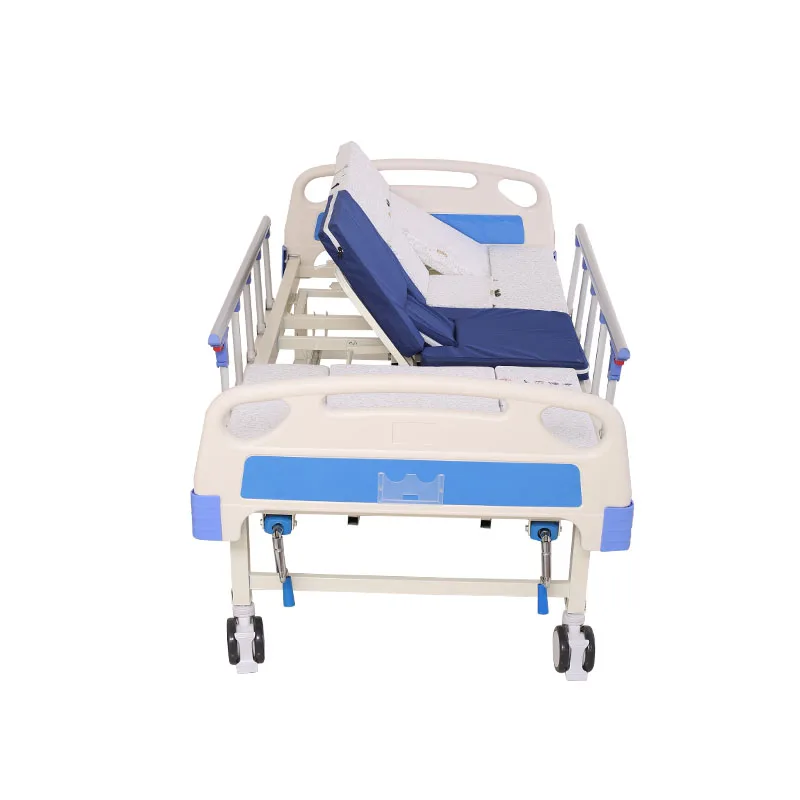 Manufacture cheap backrest semi bending homecare functions manual nursing bed with washbasin potty hole