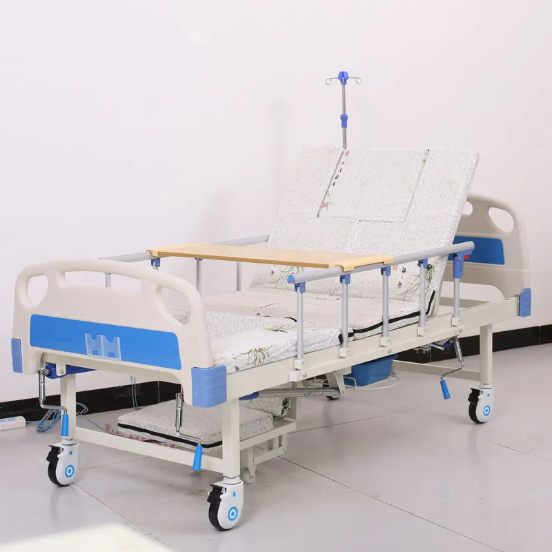 Manufacture cheap backrest semi bending homecare functions manual nursing bed with washbasin potty hole