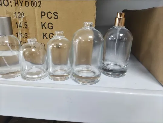 30ml 50ml 100ml clear stock round shape perfume glass bottle with crimp on aluminum fine mist sprayer