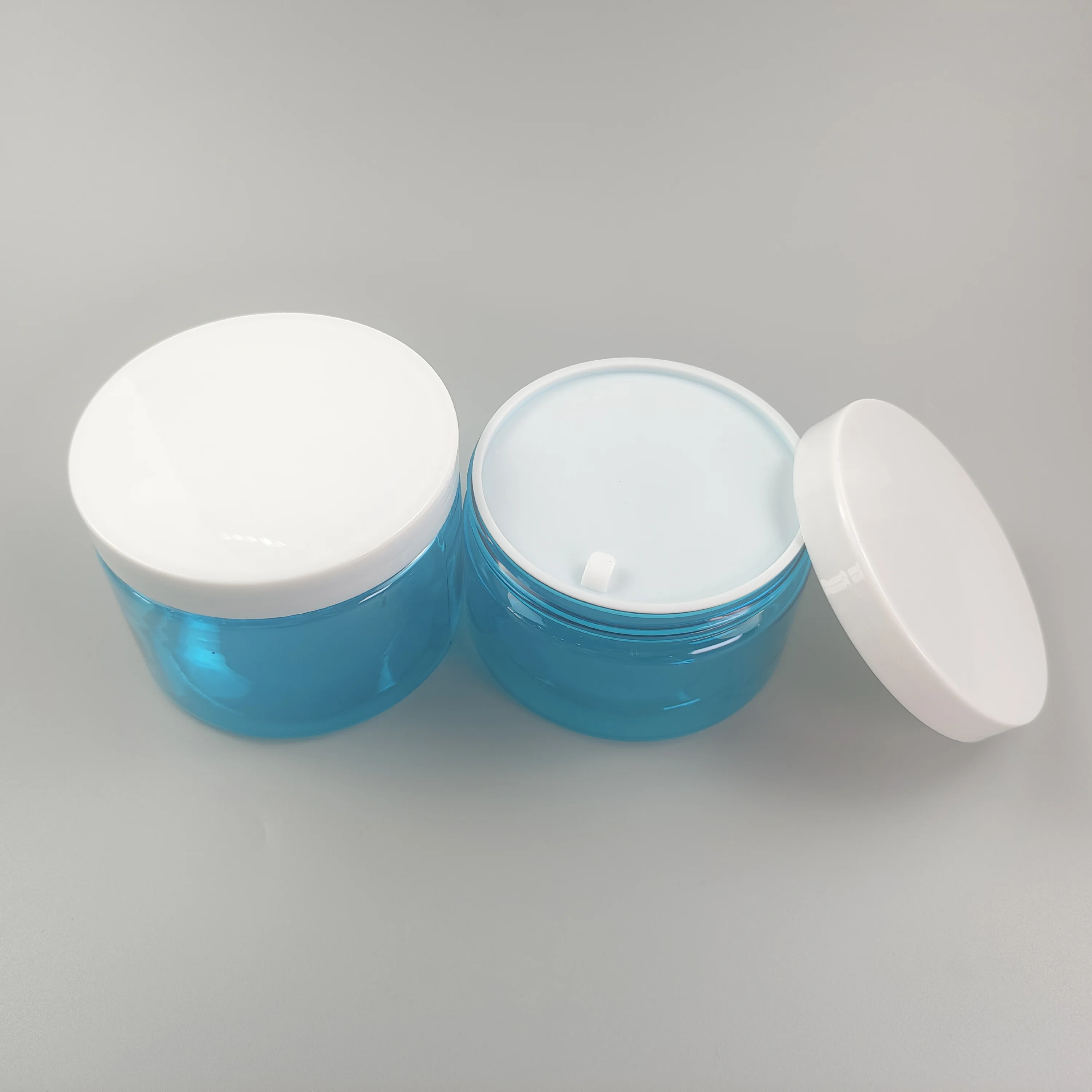 Wholesale of high-quality 5/10/15/30/50/100g transparent small plastic cans with caps for travel face cream cosmetics cans