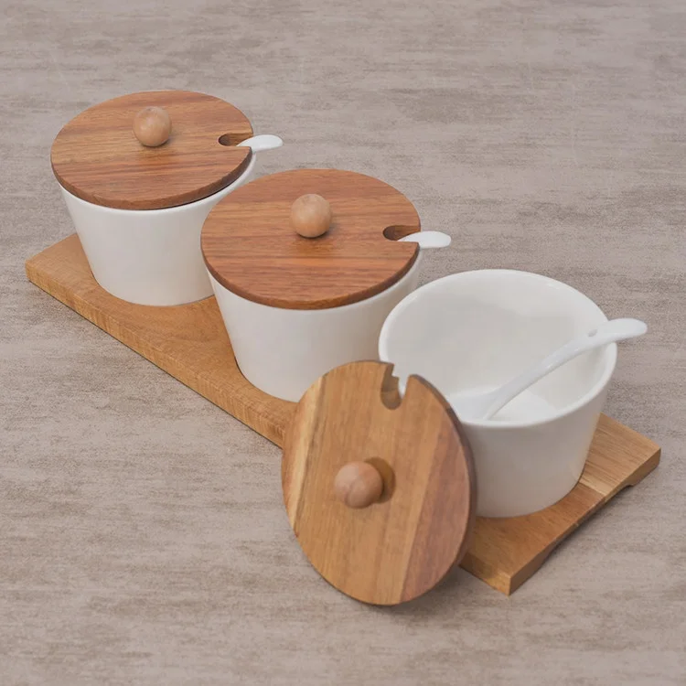 Hot sale kitchen used white ceramic spice pots seasoning pot spice jar with wood stand