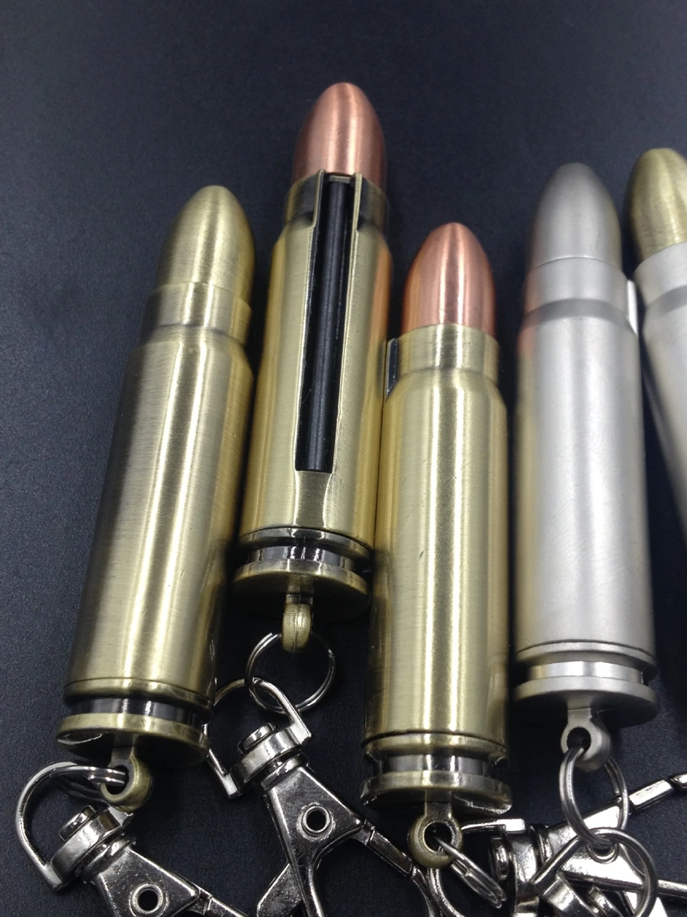 Wholesale ten thousand matches cool bullet shape flint kerosene refillable keychain lighters