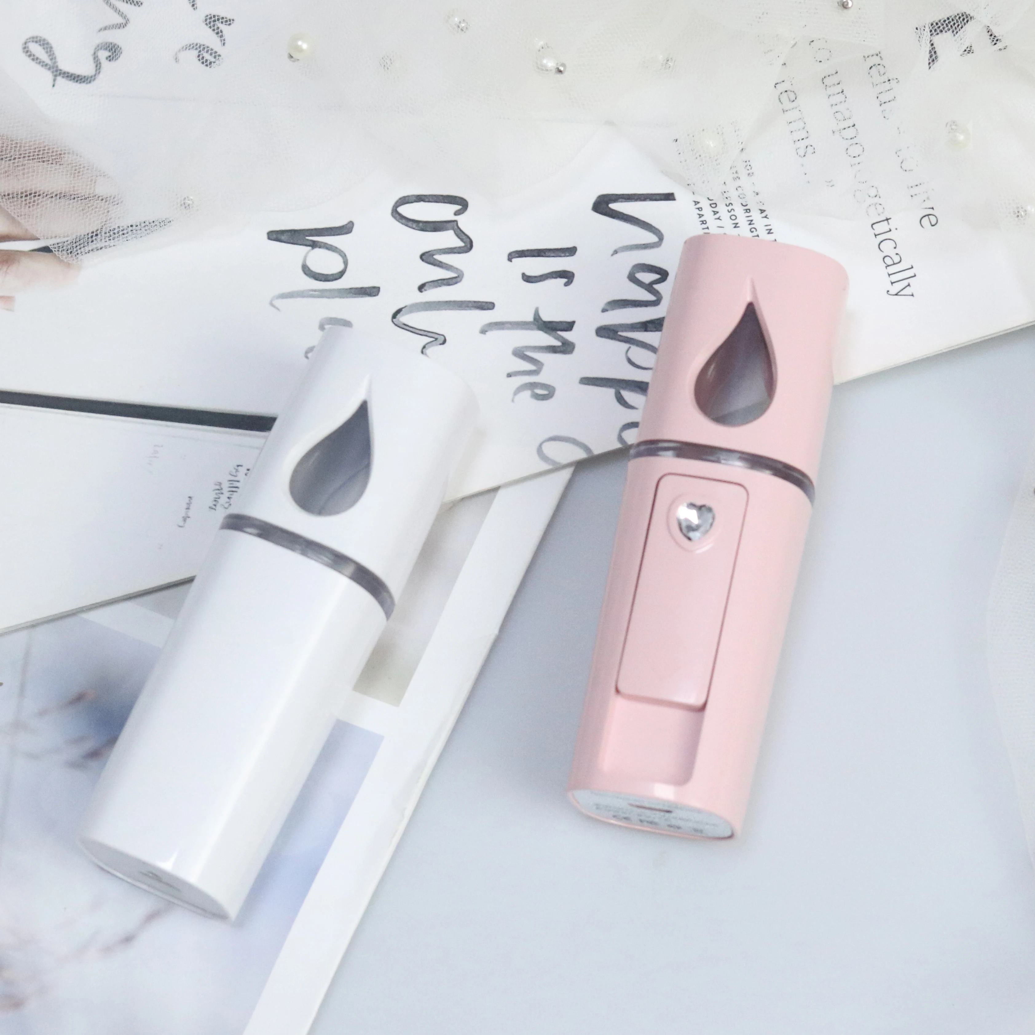 Оптовая продажа бело-розовый Портативный USB нано-спрей для удлинения ресниц красоты лица с водяным