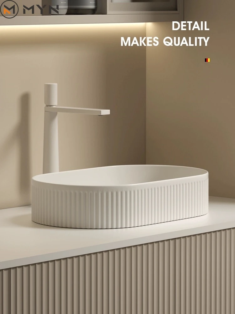 2024 Modern Design Micky White Color Ceramic Oval Round Groove Flute Shape Bathroom Art Basin Sink