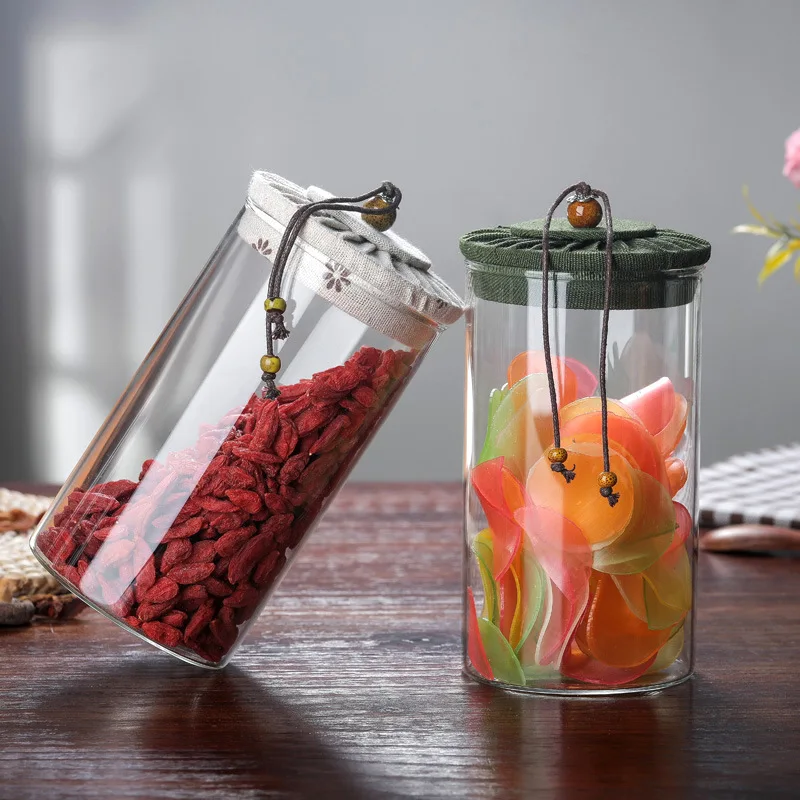 High quality fast delivery heat-resistant glass tea cabs candy storage jar food grade container borosilicate jars cloth cover