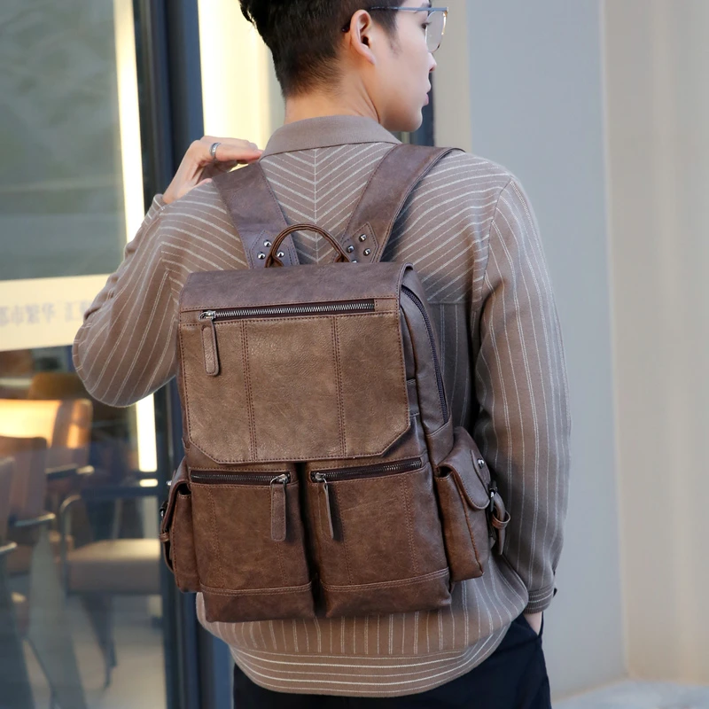 Wholesale men and women pu leather simple business laptop travel backpack computer bag