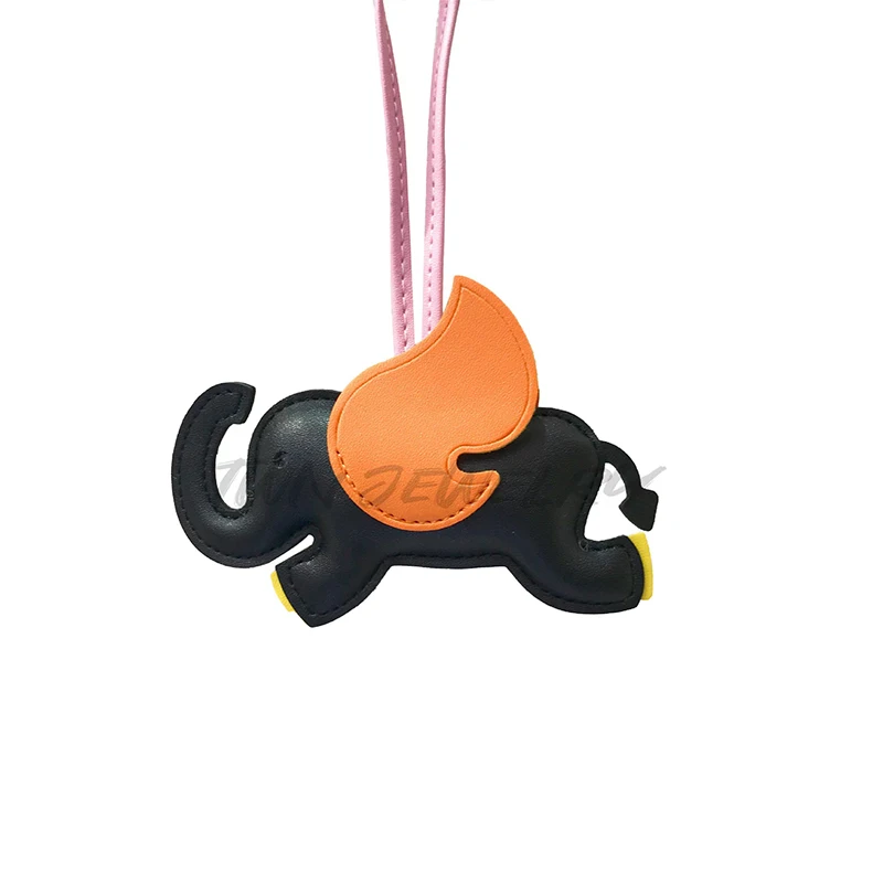 Whimsical Winged Elephant Leather Keychain Enchanting Accessory with Angelic Flair