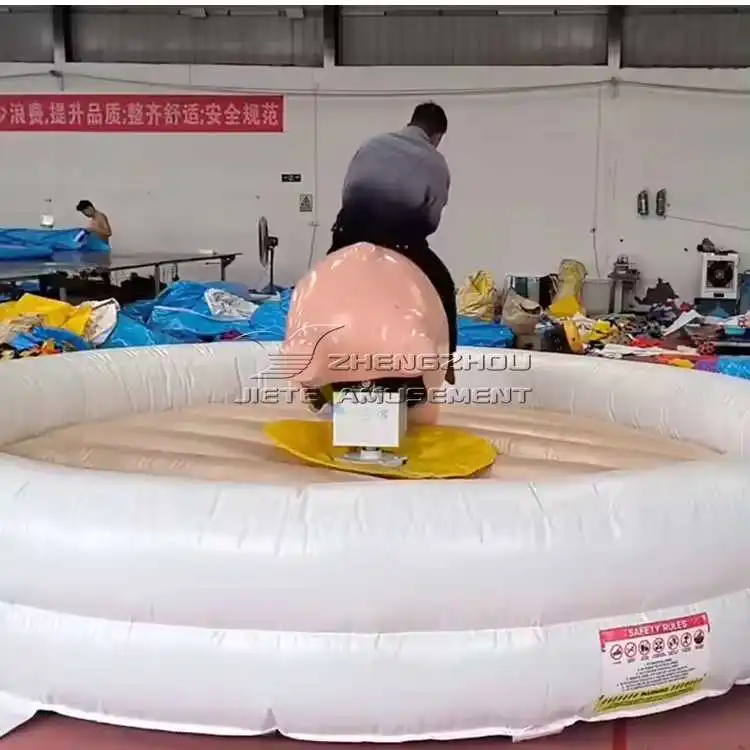 Discount Commercial sport game mechanical bull riding challenge machine inflatable rodeo bull/pig ride