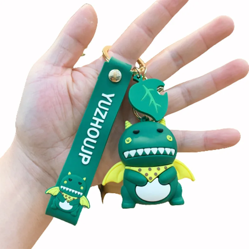 Cartoon silicone dinosaur men and women cute schoolbag small pendant doll car key chain ring creative couple key chain wholesale