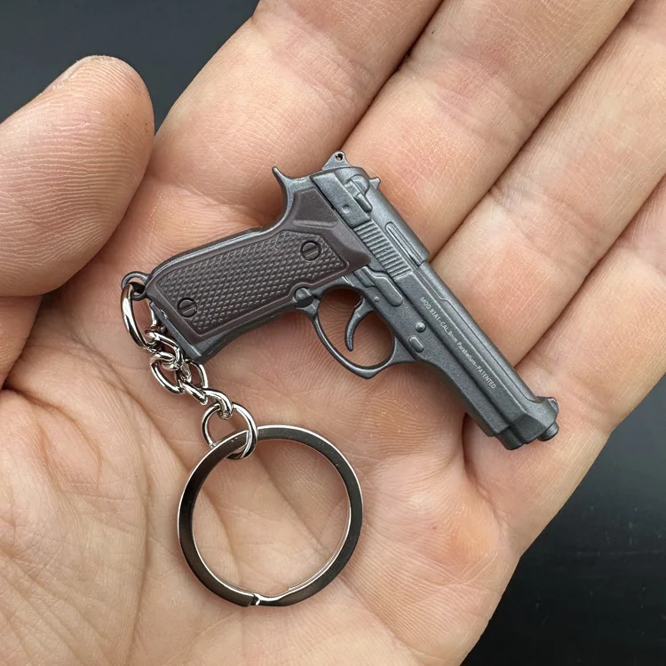 2024 Hot selling kids toys gun A mazon bullet shooting pistol gun model realistic revolver mini metal toy gun keychains gifts