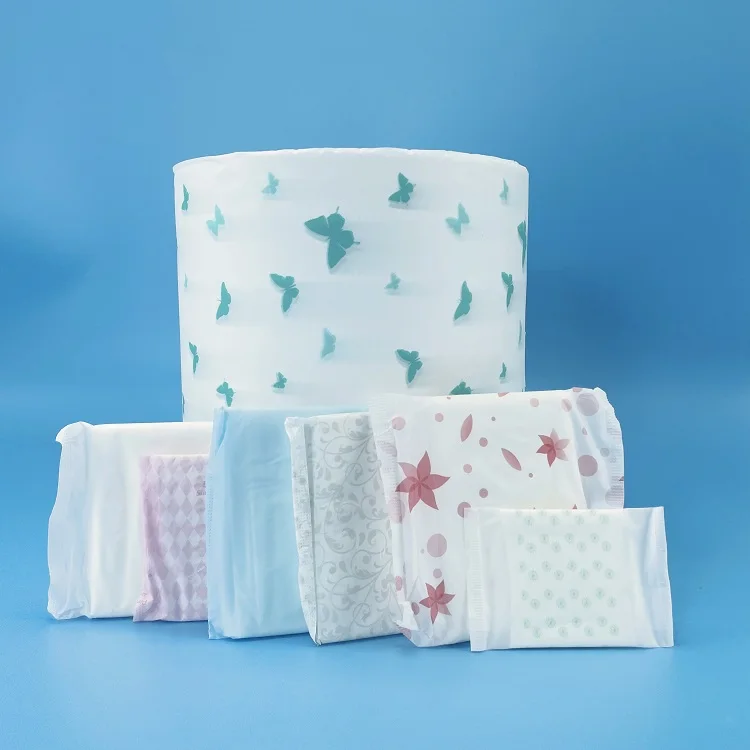 The factory sells baby / adult diapers and sanitary raw material PE film roll lamination Printing PE film Nonwoven fabric