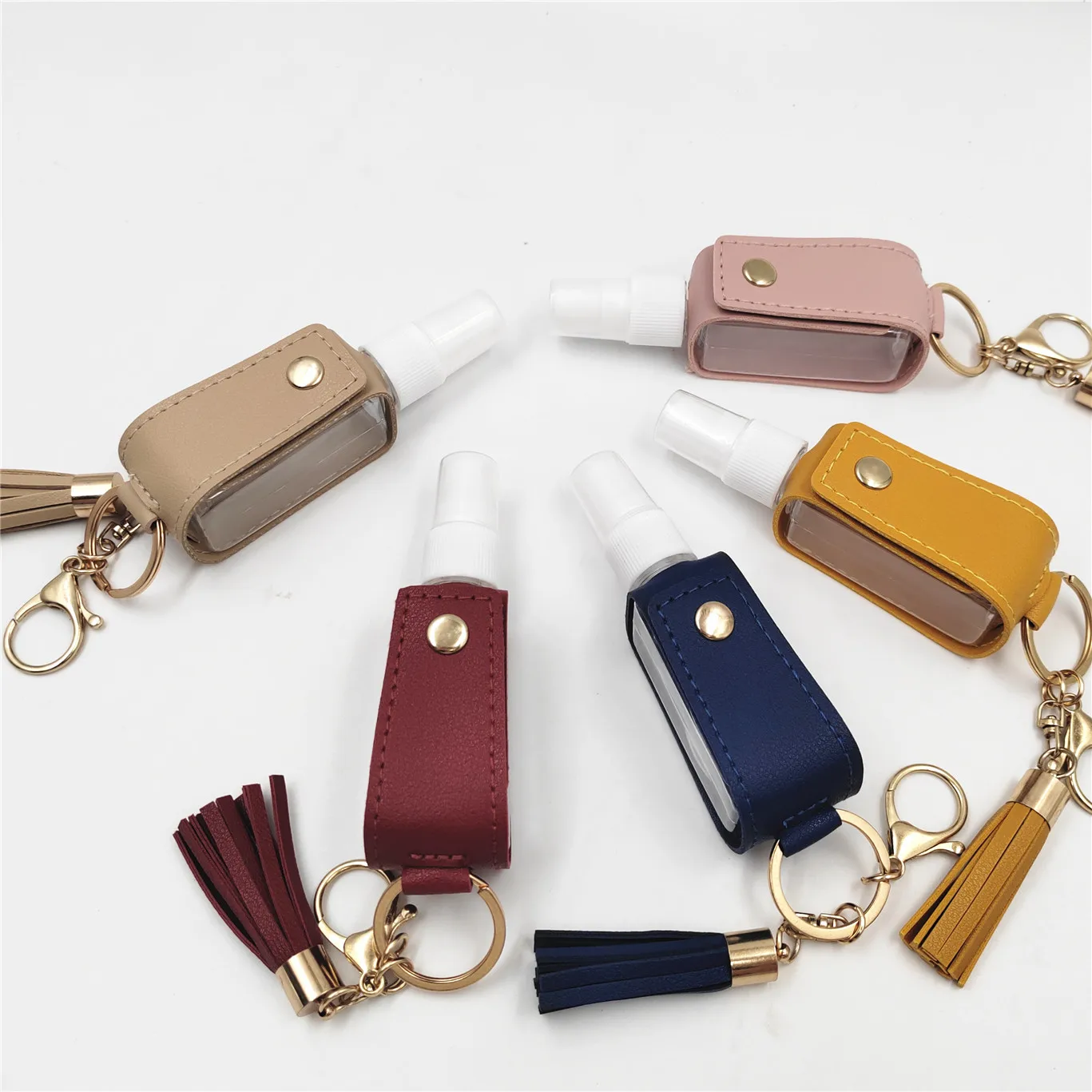 Pocket 30ml Mini Plastic Spray Hand Sanitizer Alcohol Pet Bottle with PU Leather Keychain Holder Plastic Bottle Manufacturer