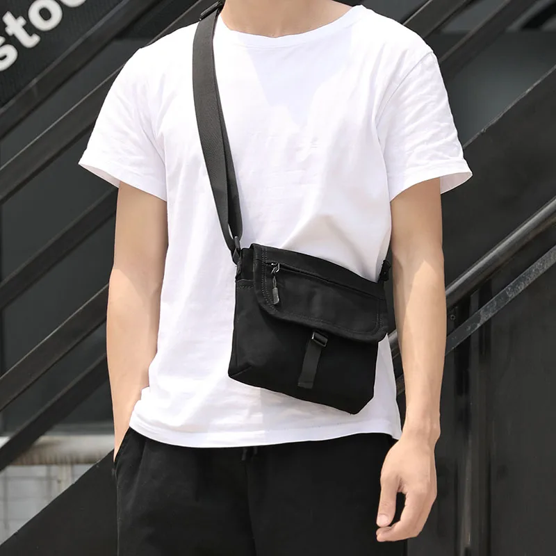 Japanese style pure color contracted cross-body bag men and women mini one-shoulder bag out of the backpack