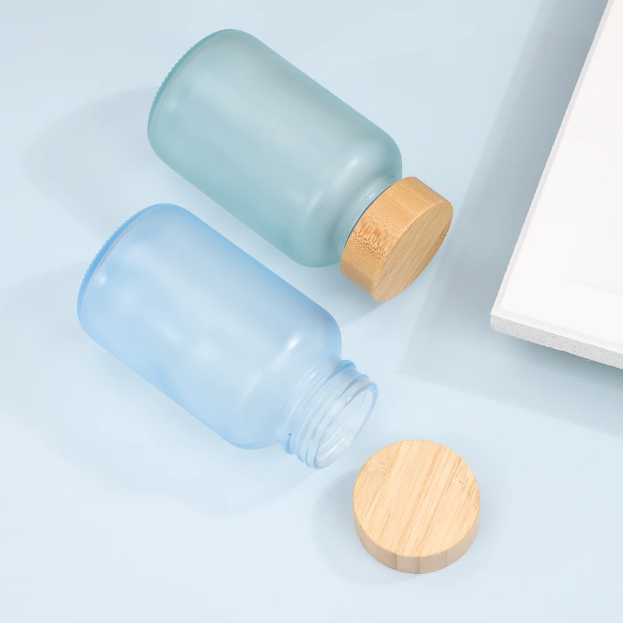 200ml Matte Blue Glass Vitamin Supplement Bottle Luxury  Pill Capsules Bottle Gummy Container with Bamboo Lid