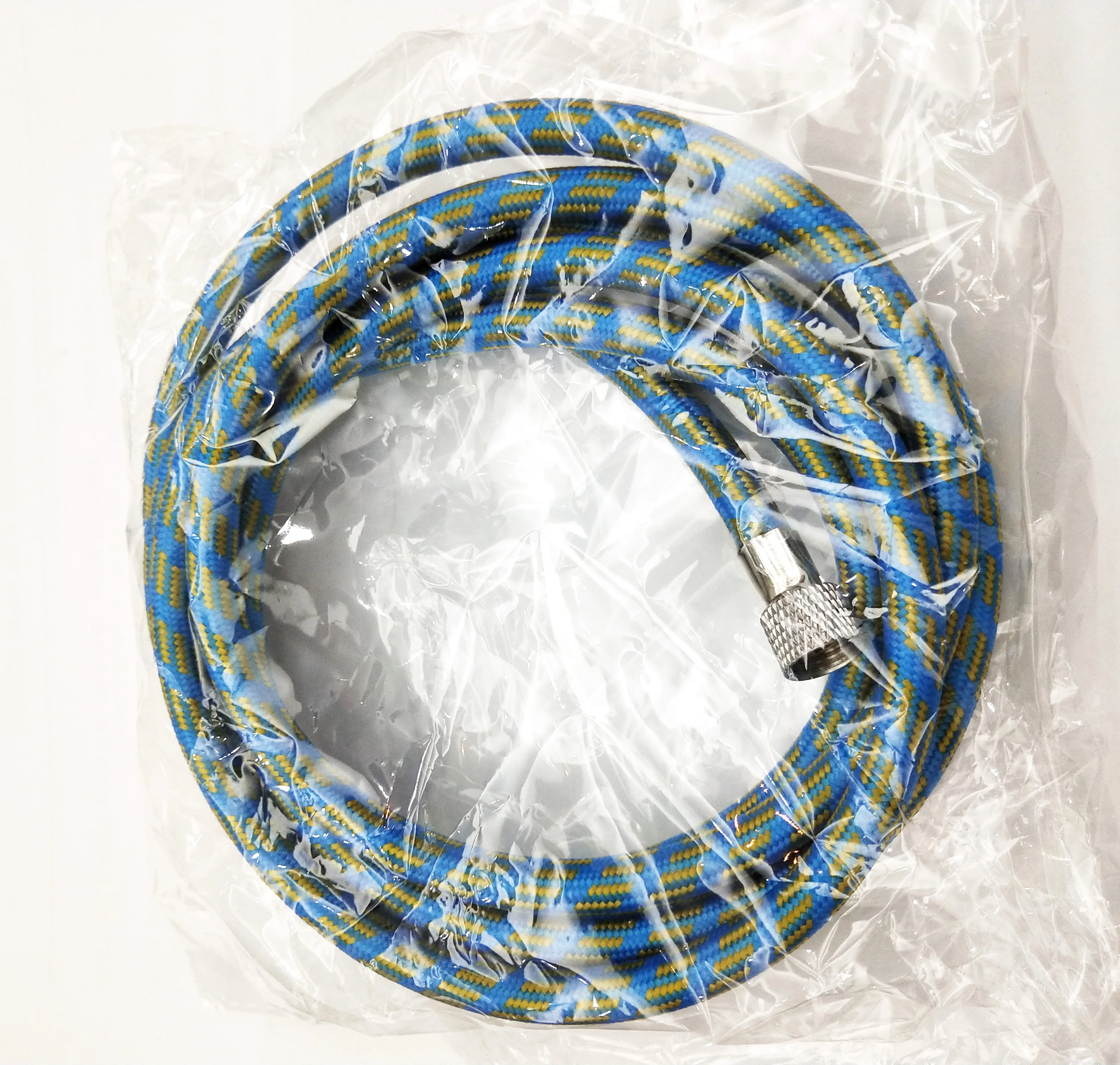 Air brush with 1.8-meter nylon braided air brush hose equipped with standard 1/8-inch size accessories at both ends