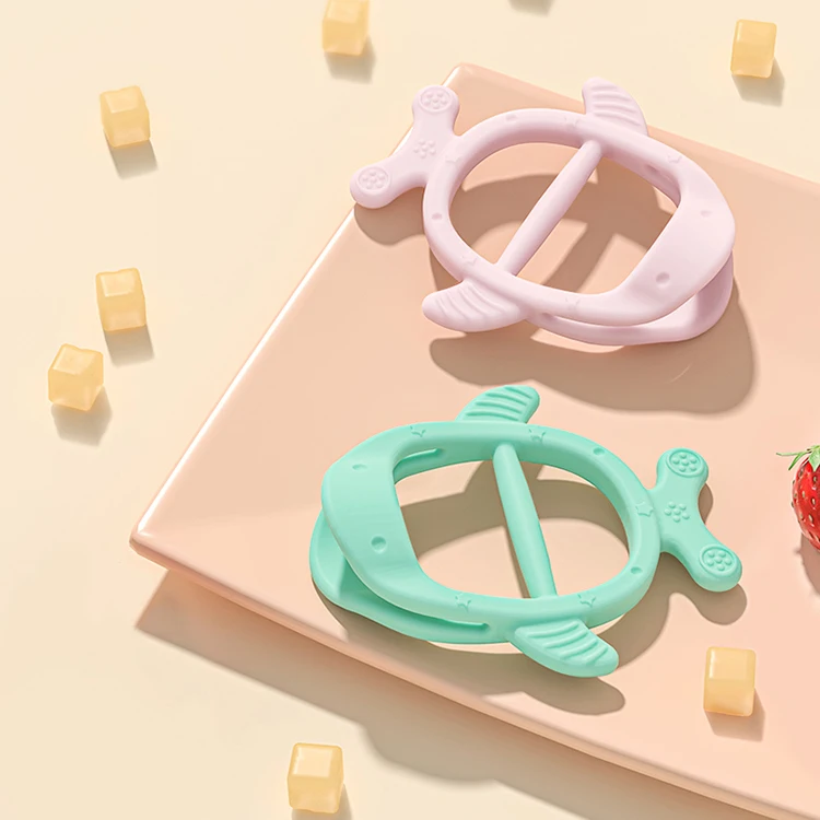 Food grade silicone chewing gum a good tool for your baby to grind his teeth silicone baby teether