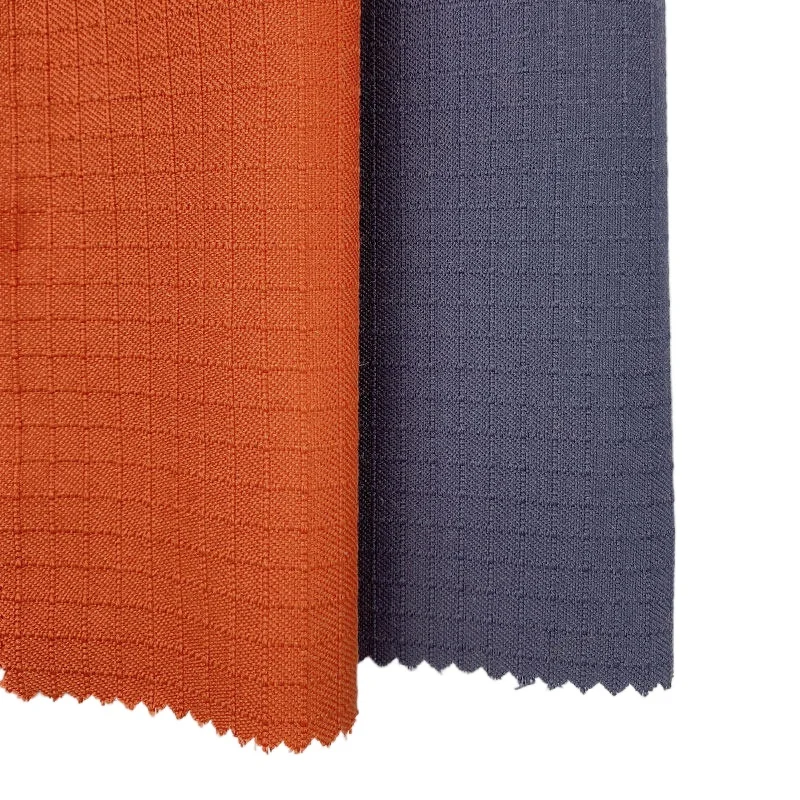 Оранжевая ткань ripstop 93% meta aramid 5% para 2% антистатическая Арамид