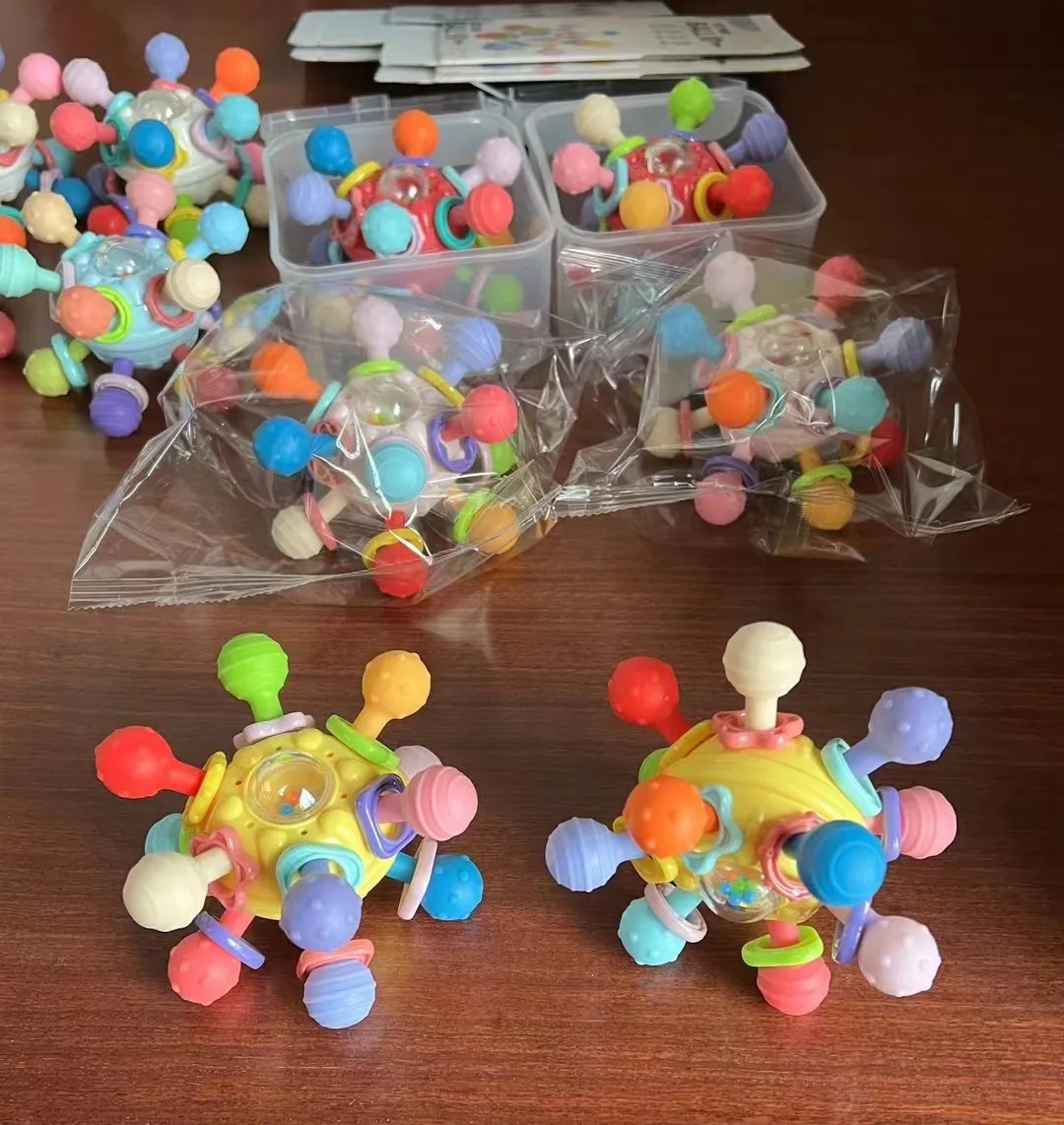 Baby rattle toy Manhattan finger ball Atomic spin soft glue ball grinding tooth hand grip ball early education toy