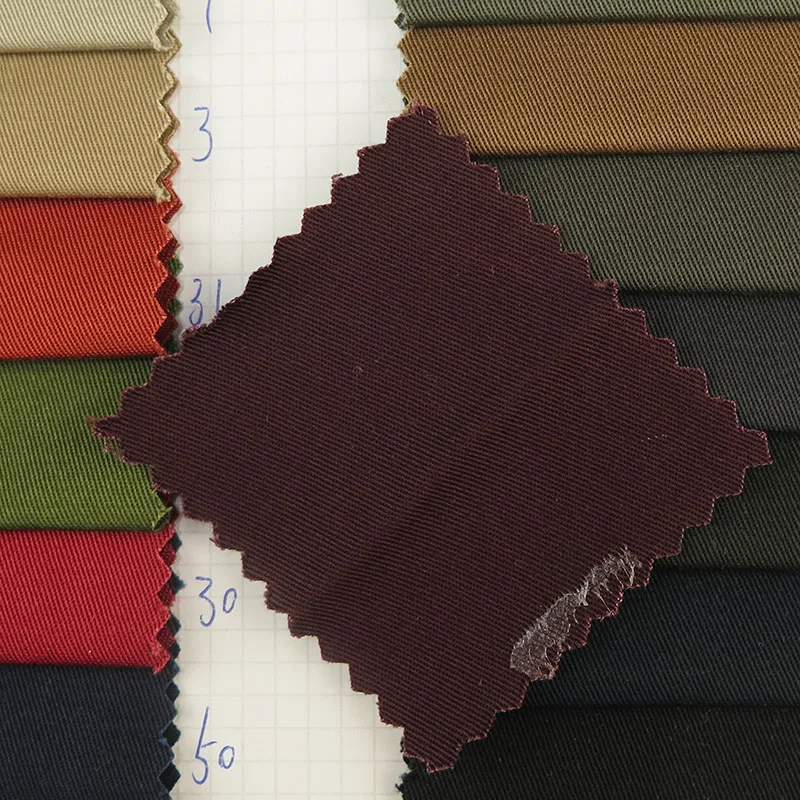 Wholesale of Source Factory Spot Thick Slanting Tencel Cotton Trousers Workwear Trousers Cloth Jackets Coats Fabr