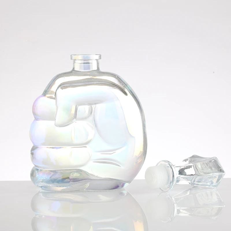 factory price high capacity hand model creative design 750ml transparent liquor glass bottle
