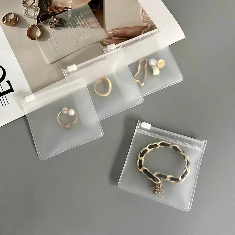 Custom Frosted Transparent Plastic Zip Lock Pouch Pvc Earrings Jewelry Storage Packaging Zipper Bag For Jewelry