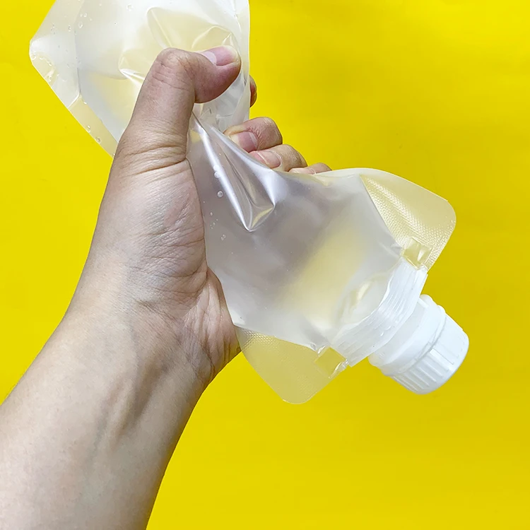 Clear Transparent Plastic Stand Up Packaging Soft Drink Bag with Spout
