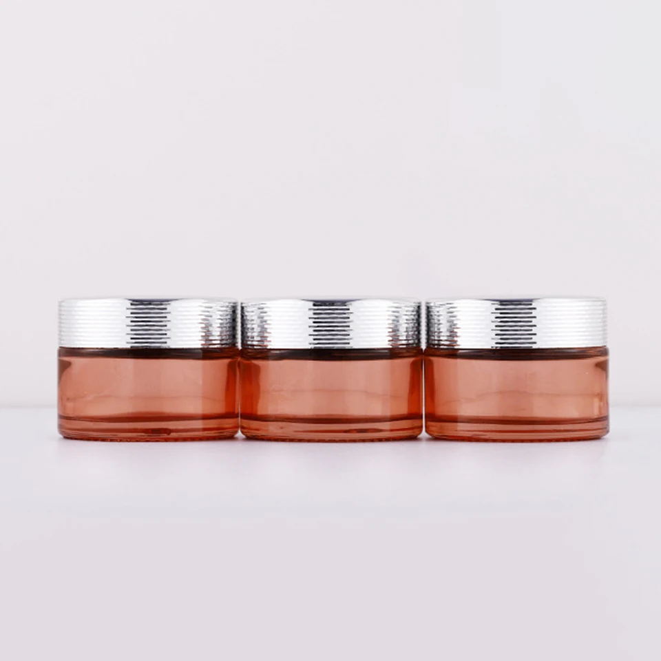 New product 5g 10g 15g 30g 50g 100g  clear pink glass cream jar with gold black sliver aluminium Cap Luxury skincare packaging