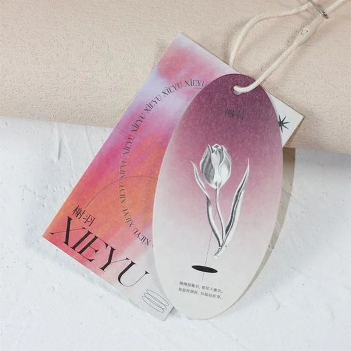 Best Selling transparent plastic hang tags custom embossed hang tag private label hang tags
