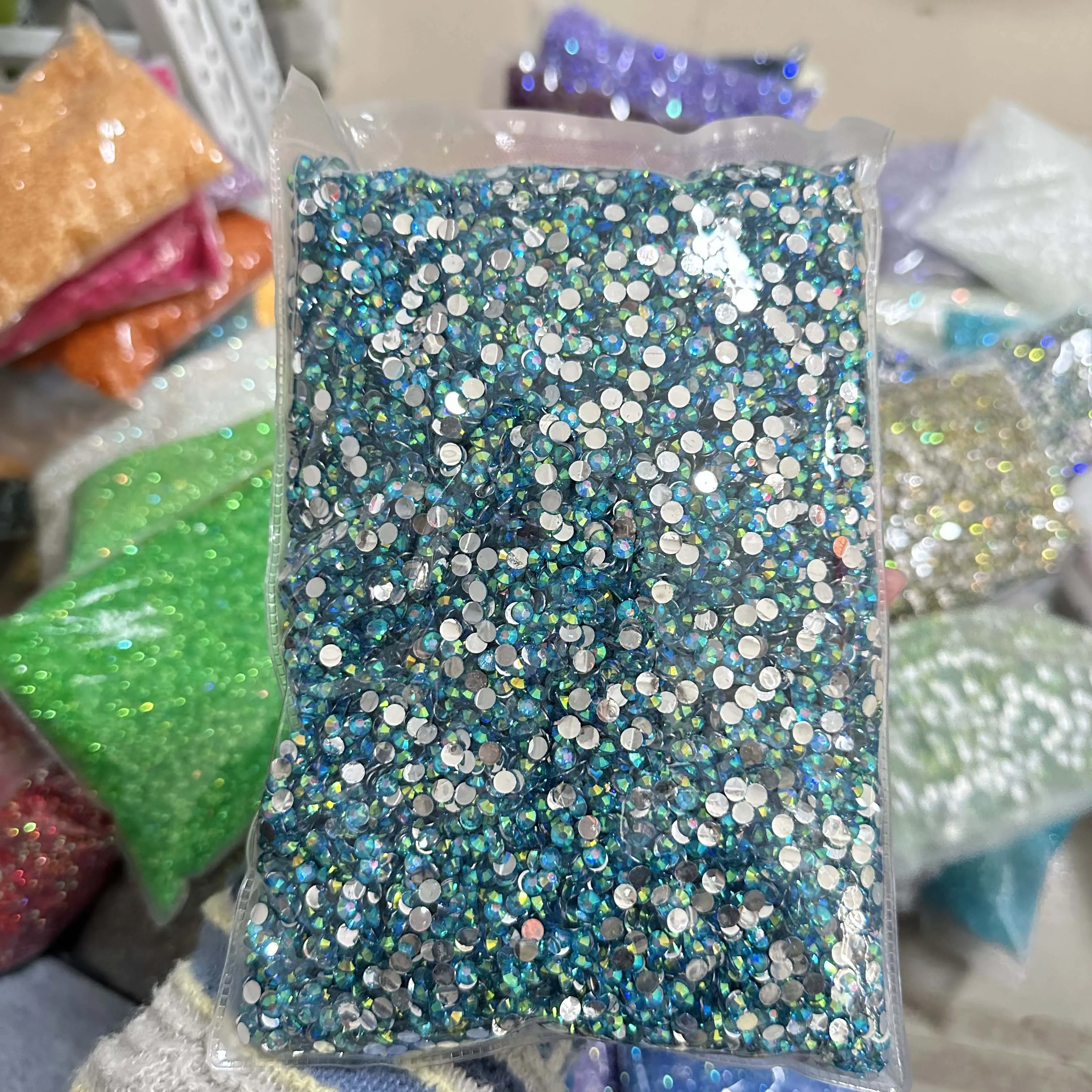 XULIN Wholesale Bling Bling 100 Kinds Colors 2mm 3mm 4mm 5mm 6mm Flat Back Crystal AB Resin Rhinestone for Nail Art Decoration