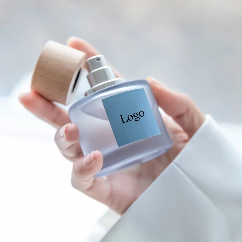 Factory Wholesale High Quality 50 Ml New Designer Wooden Bottle Cap Glass Perfume Bottle Box Packaging