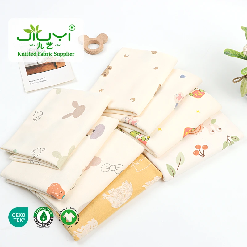 In stock 40S Printed combed brushed 100 cotton Interlock fabric cartoon knit fabric for baby clothes and Jumpsuits