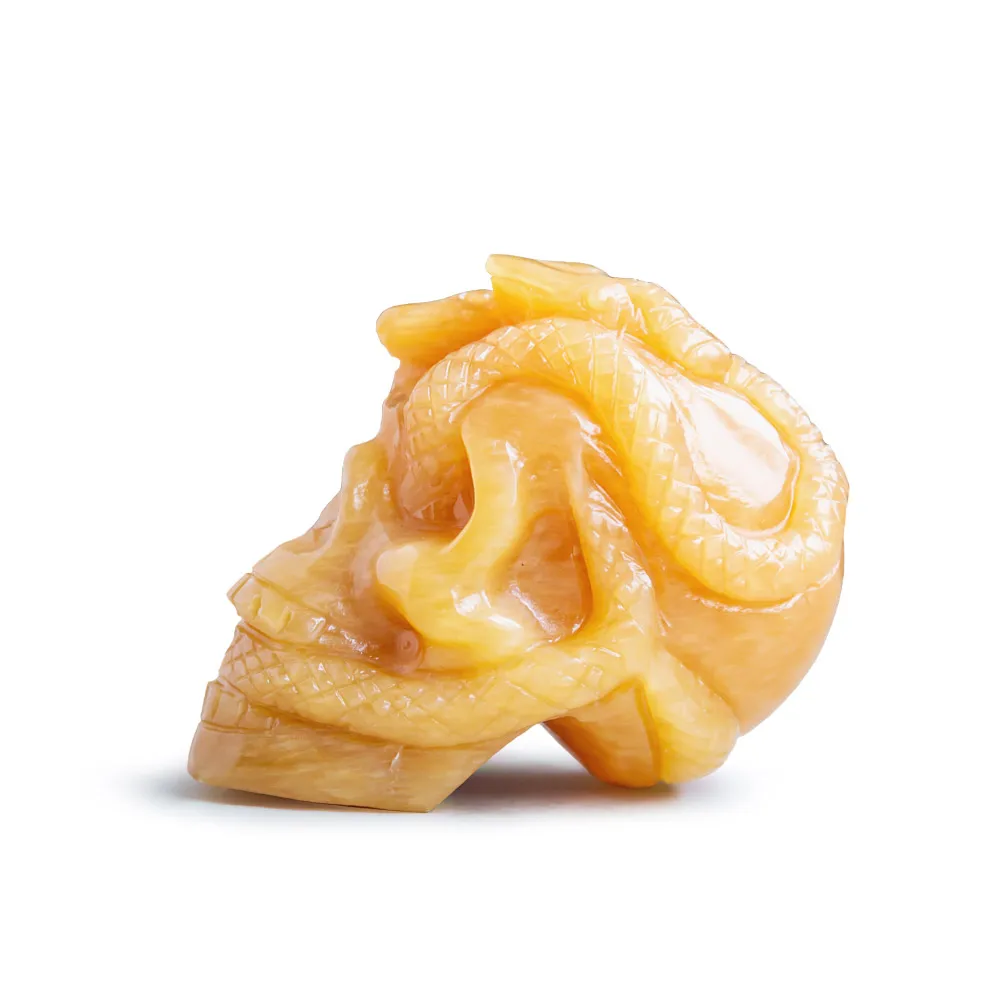 Wholesale natural high quality hand carved orange calcite crystal skulls folk carfts with snake for Halloween decoration