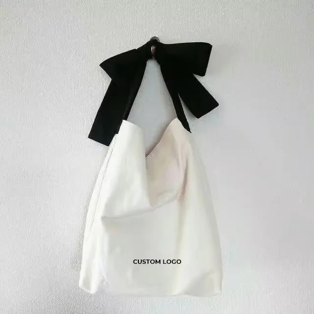 Custom logo female elegant canvas cotton drawstring shopping tote bag with satin silk ribbon bow