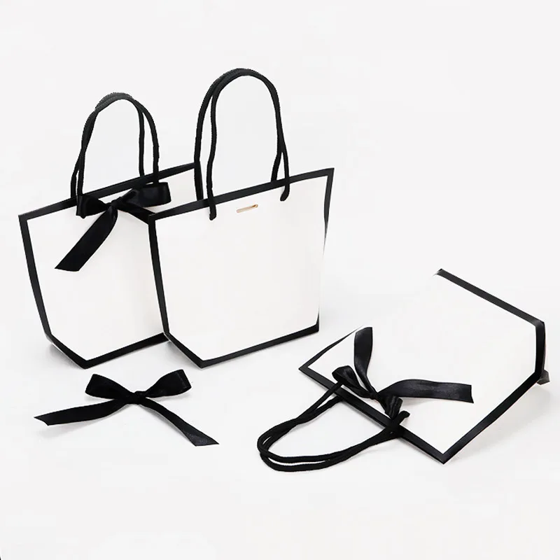 Custom design gift shopping paper bags with your logo jewelry gift paper bags with bow tie
