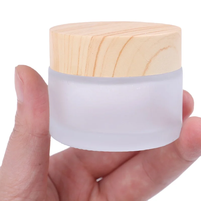  Wholesale recycled glass jars with plastic bamboo lids frosted cosmetic for body