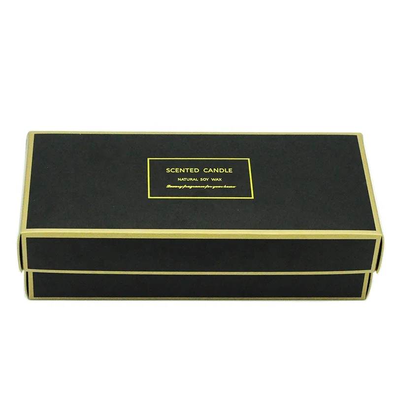 A three-piece black glass jar scented candle gift set