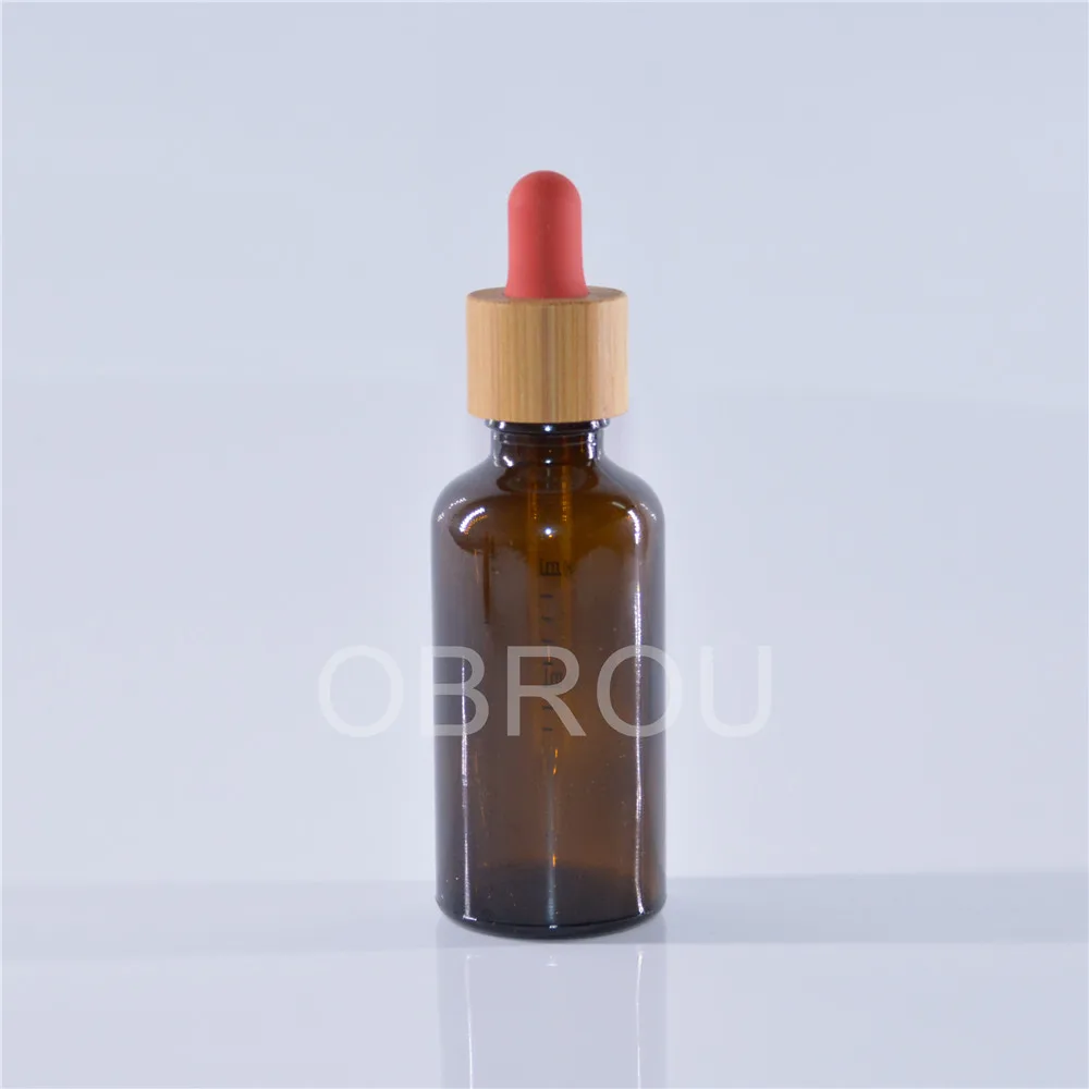 Wholesale wooden dropper cap type amber glass dropper bottles 5ml 10 ml 15ml 20ml 30ml 50ml 100 ml perfume oil bottle