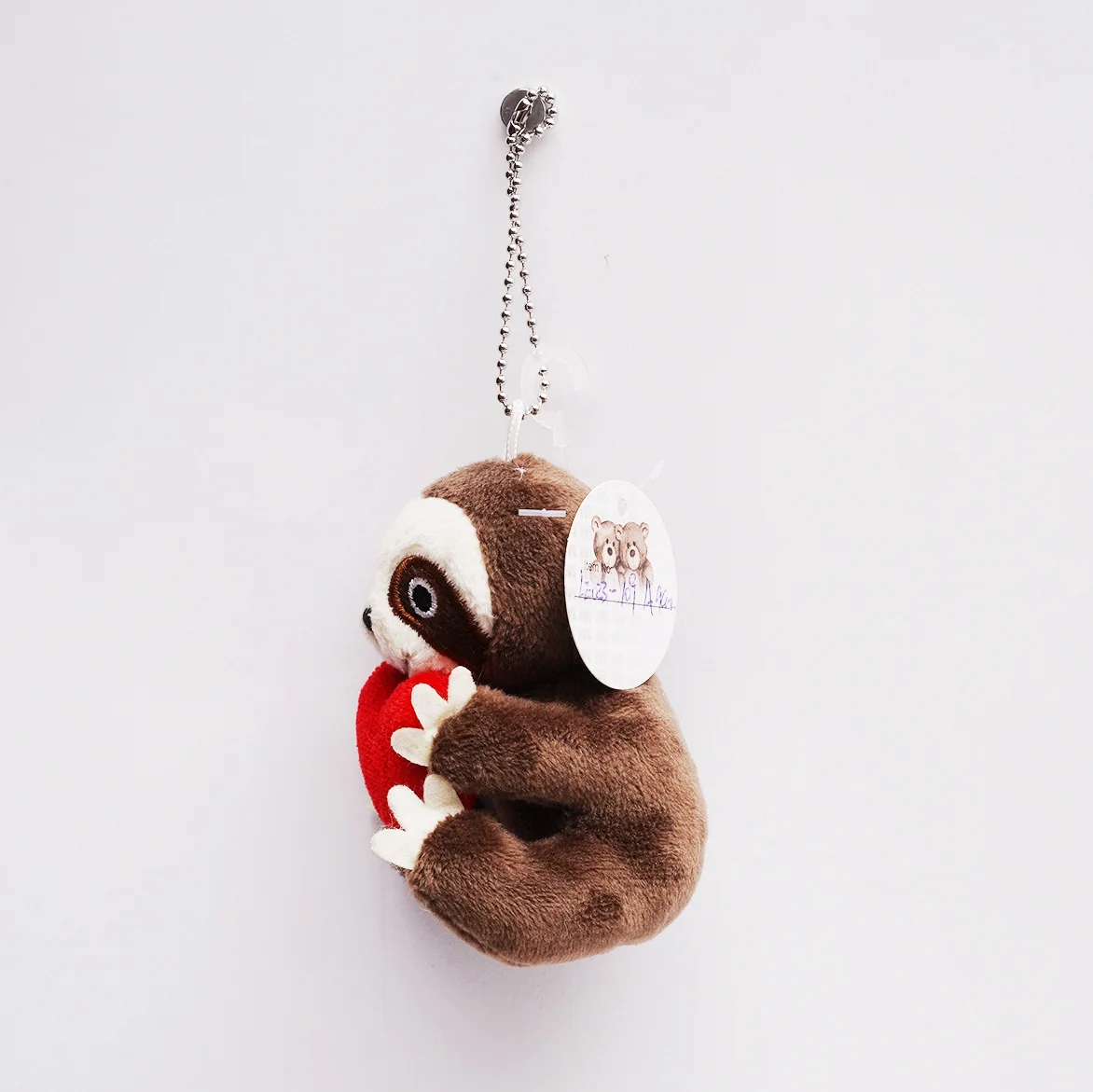 best selling cute heart holding sloth keychain adorable unique heart holding sloth keychain OEM ODM New eco-friend fabric