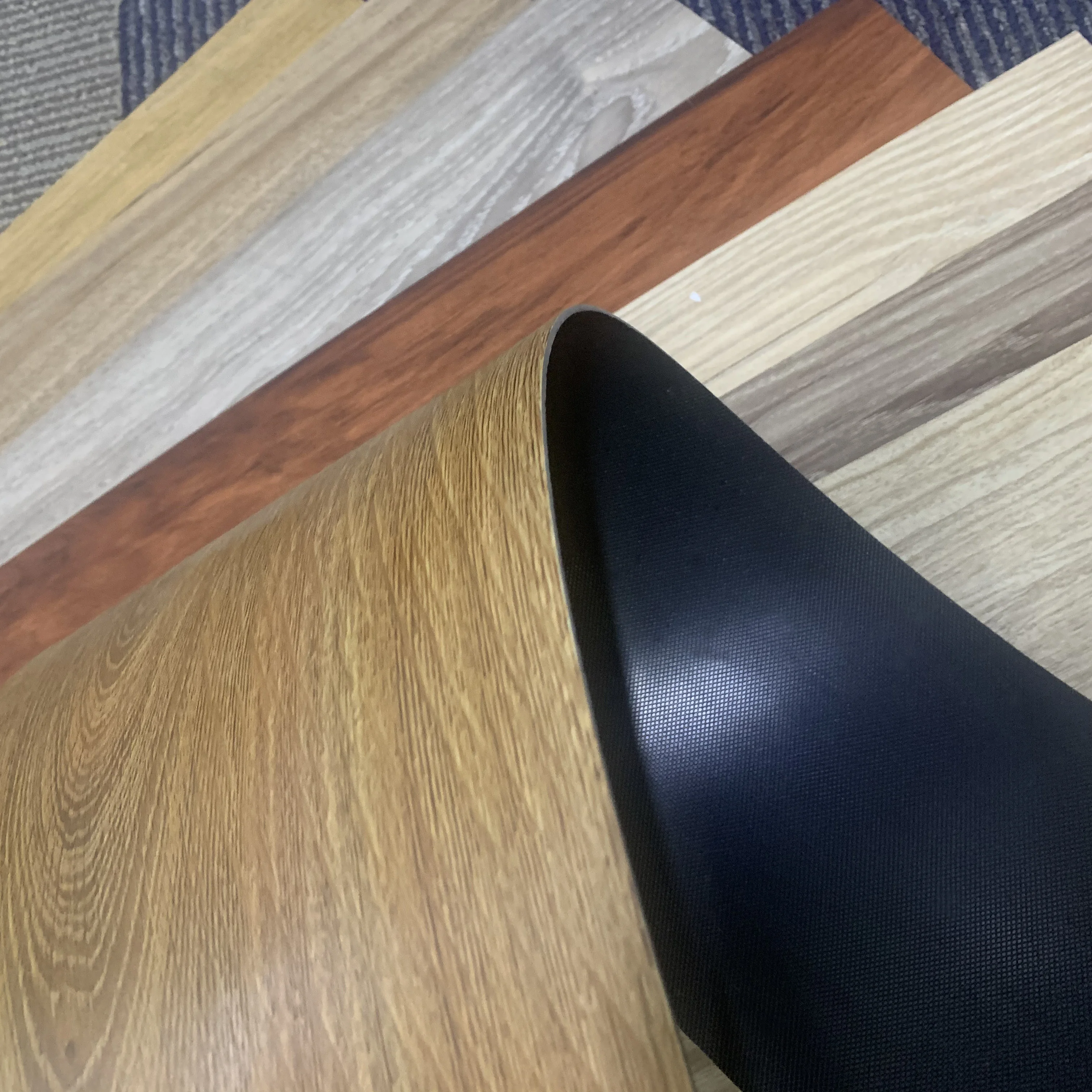 cheap click lock waterproof pvc vinyl plank plastic flooring tiles