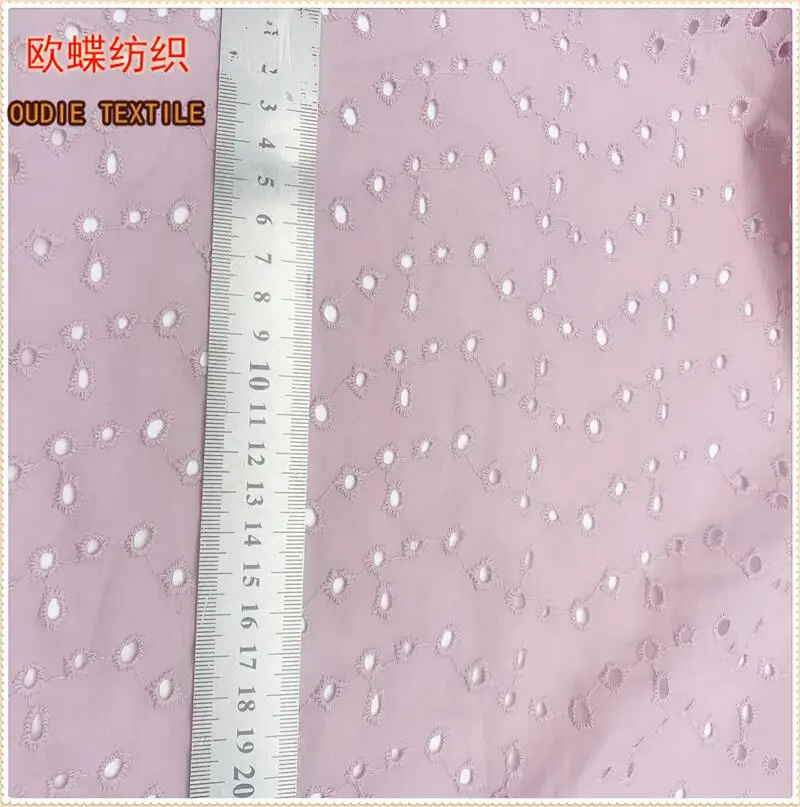 Chinese factories wholesale sell 100% cotton hollow out flower lace cotton embroidered fabric at a low price
