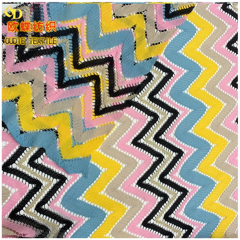 The manufacturer directly provides polyester yarn dyed blended polyester bright silk mesh knitted clothing fabric