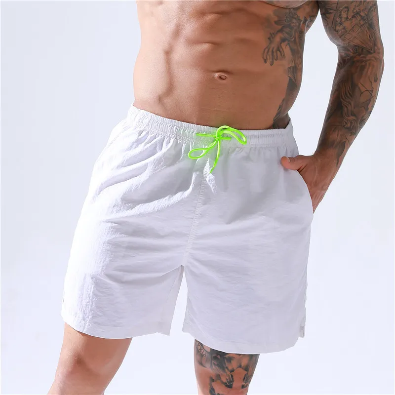 wholesale men pants summer sports shorts loose fit quick dry polyester board shorts male swim trunks beach shorts with pockets