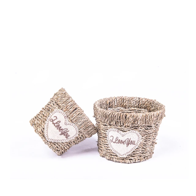 New design baby gift sweet rattan plastic basket with heart shape label woven storage basket handmade nature paper rope