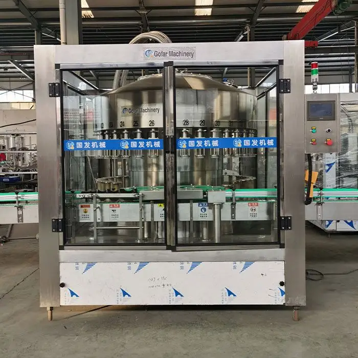 High Efficiency Automatic vacuum rotary 12 18 24 36 Heads liquid filling machine vodka spirit whisky wine filling machine