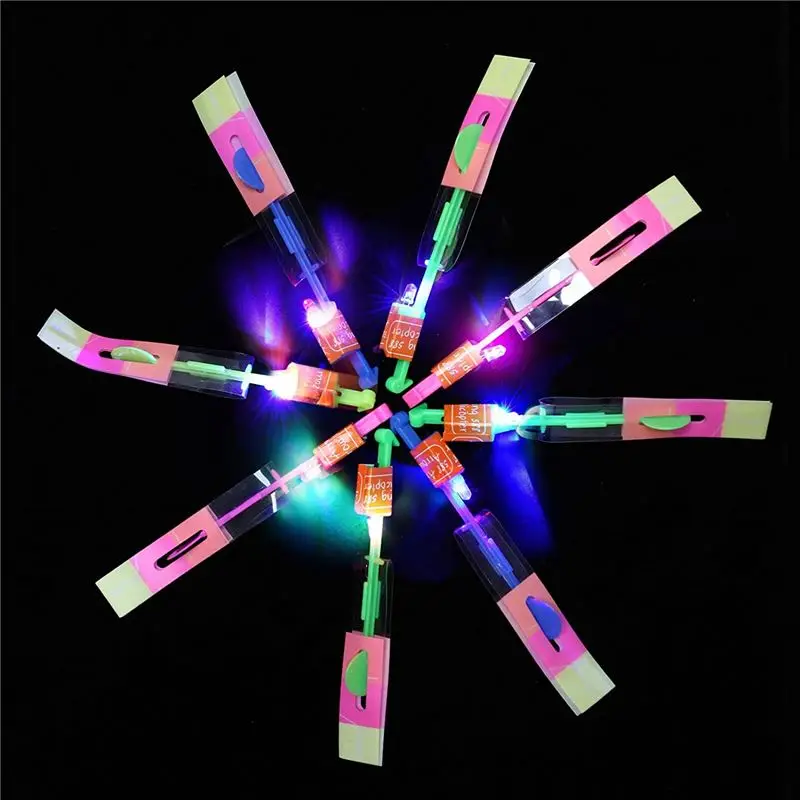 New Outdoor Led Rocket Slingshot Shining Light Flash Elastic Helicopter Rotating