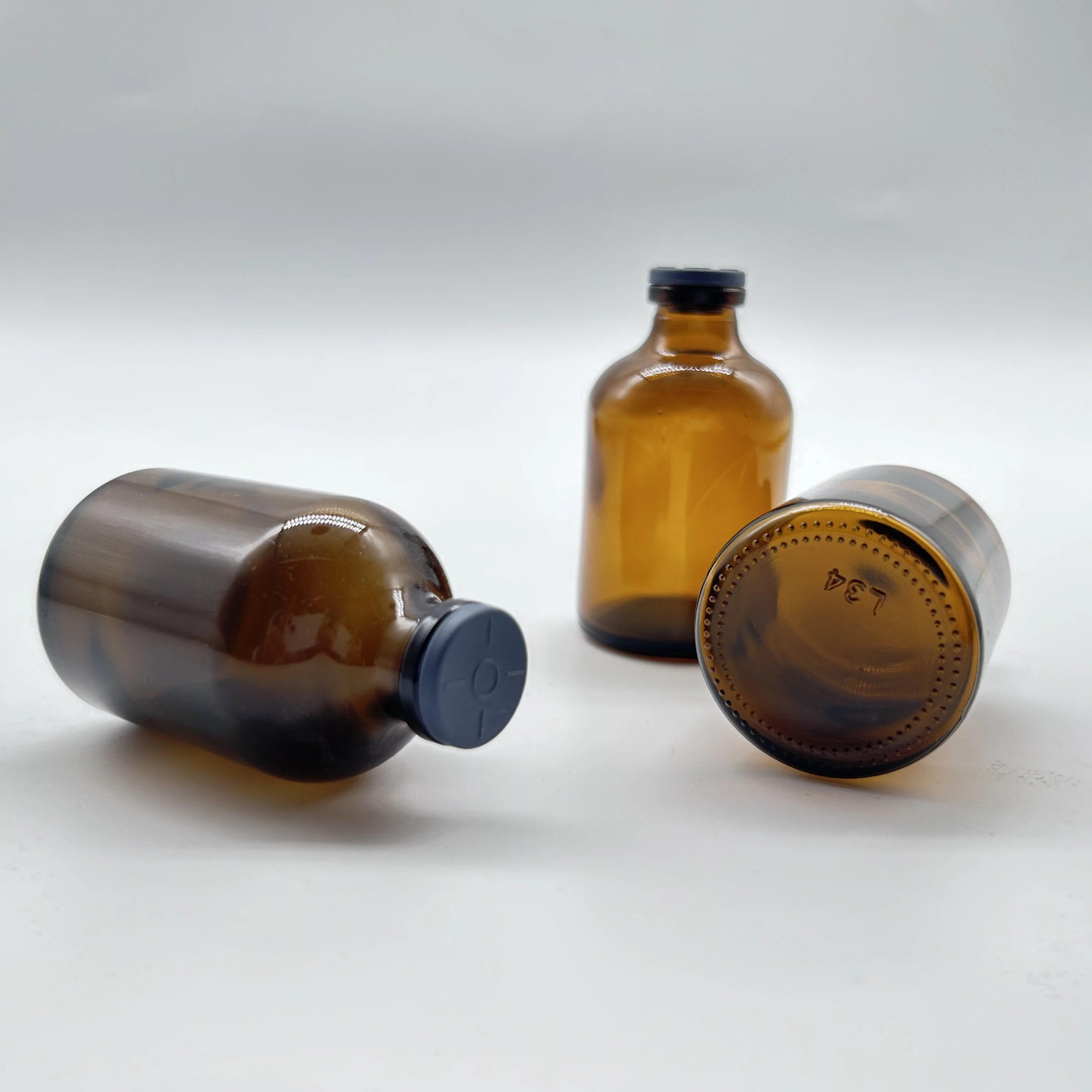ShanDong Hot Selling New Products Amber 100ml Moulded Injection Vials For Antibiotics With Aluminum Plastic Composite Cap